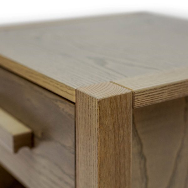 Close up detail of the grey wash Ash Woodland bedside storage for kids.