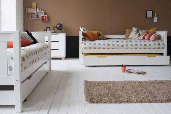 Convertible Classic Beech bunk beds, divided into 2 full size single beds and trundle beds underneath.