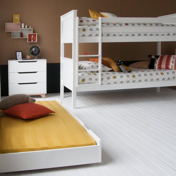 Trundle bed, separate to Classic Beech Bunk bed in white, with chest of drawers behind