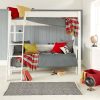 white children's classic loft bed with a sofa bed underneath, in a travel inspired bedroom for sharing siblings