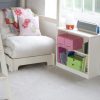 detail of futon chair bed and bookcase, girls room
