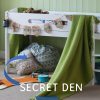 Secret den for kids under sturdy white storage cabin bed