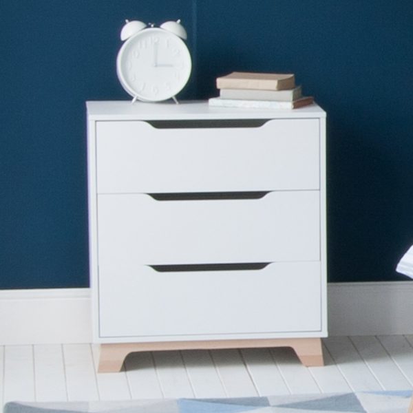 EDIT chest of drawers, white scandi style, with clock and books on top. Blue background