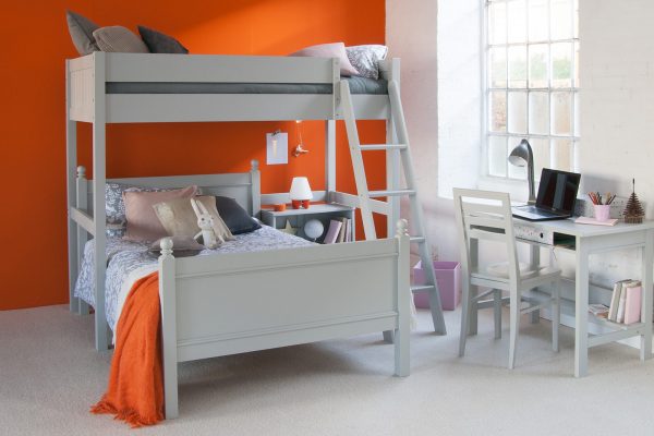 Orange child's room with double bed and high sleeper bed over the top