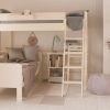 White high sleeper loft bed with day bed and storage desk, in child's bedroom with fireplace