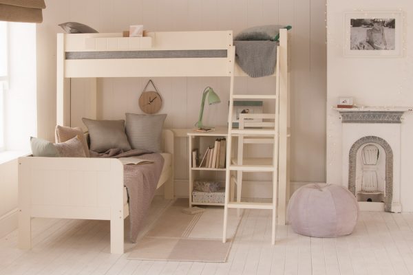 White high sleeper loft bed with day bed and storage desk, in child's bedroom with fireplace