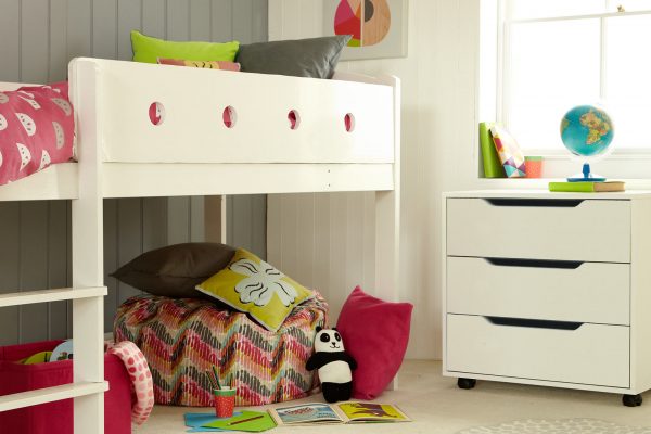 Mid sleeper bed with ladder on the left hand side and a freestanding chest of drawers