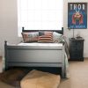 Fargo Painswick Blue small double bed with a bedside table, in a boys blue & red bedroom.