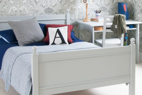 Farleigh Grey Fargo small child's double bed, with desk, in dinosaur room.