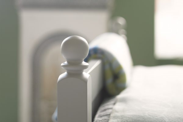 Detail showing craftsmanship of bed post for Fargo bed, Farleigh Grey.