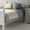 Fargo single bed in Farleigh grey with a 3 drawer grey bedside table and maps on the wall