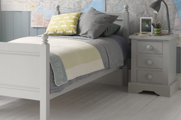Fargo single bed in Farleigh grey with a 3 drawer grey bedside table and maps on the wall