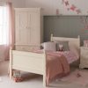 Cream single bed for girls, wardrobe, bedside with panelled classic wall