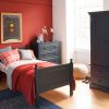 Fargo single bed in navy blue, with an oak floor, classic bedroom