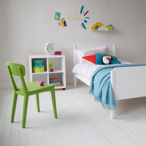 Colourful child's bedroom featuring the Edit single bed in pure white, with curved retro style edges