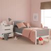 Scandinavian style Edit single bed in a grey and pink girls bedroom. Quality single bed with curved, retro edges and a chest of drawers
