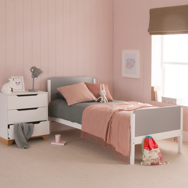 Scandinavian style Edit single bed in a grey and pink girls bedroom. Quality single bed with curved, retro edges and a chest of drawers