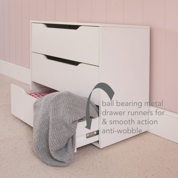 white chest of drawers with cut out handles and smooth anti-wobble action.