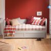 Red and grey boy's bedroom with daybed and trundle underneath, red cars, vintage styling