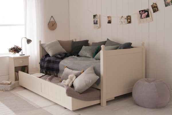 Fargo daybed with pull out sleepover trundle underneath in girls modern country bedroom