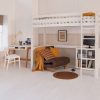 Classic high sleeper bed in gender neutral bedroom with brown futon, scandi desk and storage
