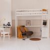White loft bunk bed with brown futon, white scandi desk, white storage and mustard accessories.
