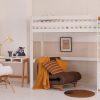 White sturdy high sleeper loft bed + brown futon + desk + chair in neutral child's bedroom