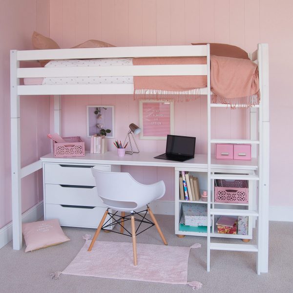 white loft bed in girls room. Study desk, chest of drawers and storage - saving space under the bed
