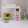 White loft bed dressed in bright colours with desk, storage and futon chair underneath