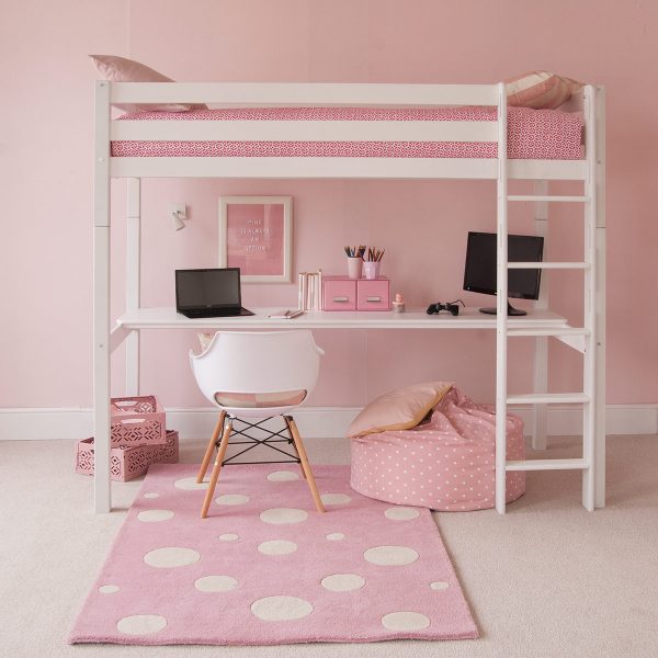 white loft bed in pink bedroom with full length desk under bed