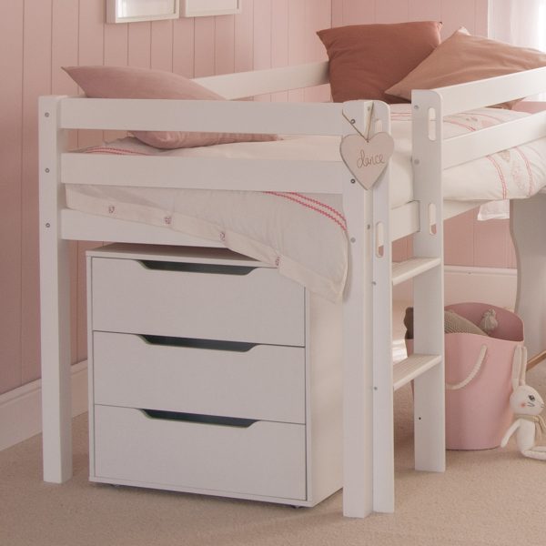 Close up of a white mid sleeper cabin bed with chest of drawers underneath