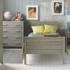 Grey wash Ash Woodland bed with wardrobe, chest of drawers and a bedside table, with a global travel theme.