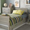 Grey wash Woodland ash single bed with a chest of drawers and bedside table, in a global travel themed bedroom