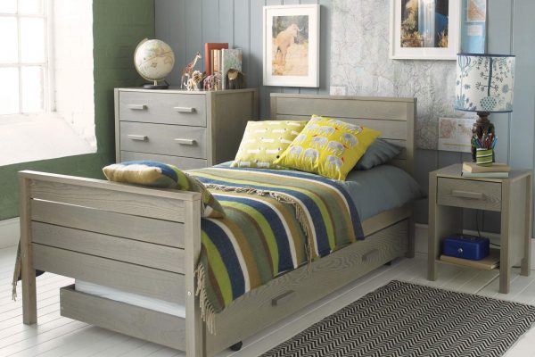 Grey wash Woodland ash single bed with a chest of drawers and bedside table, in a global travel themed bedroom